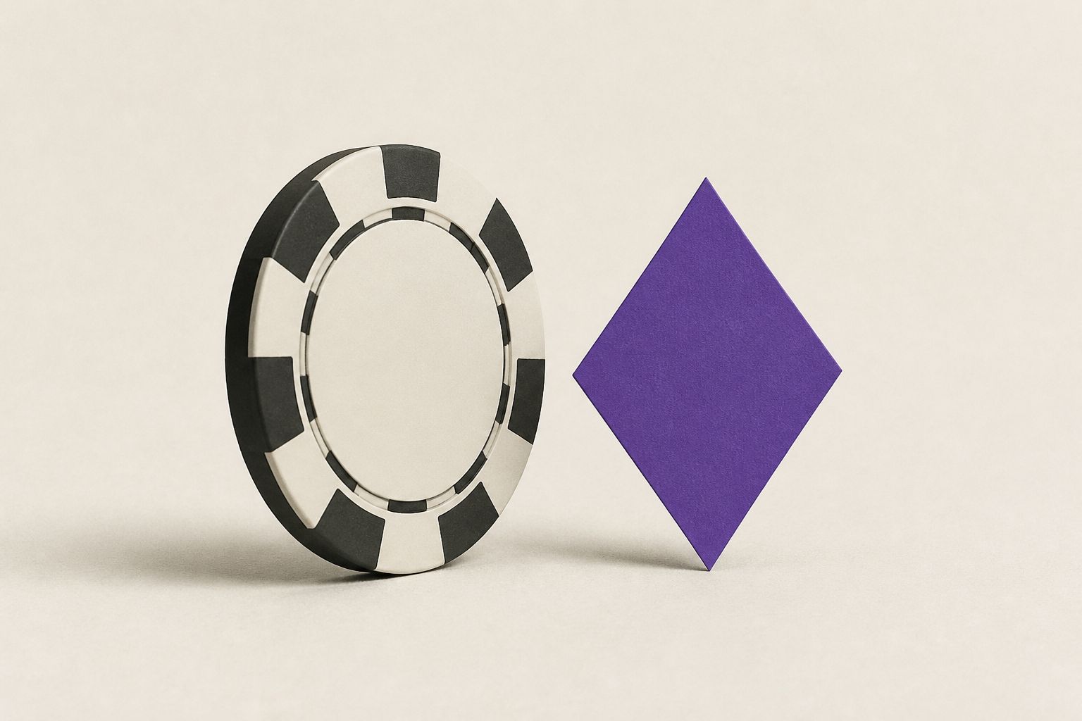 A bone-and-charcoal poker chip standing beside a violet diamond pip